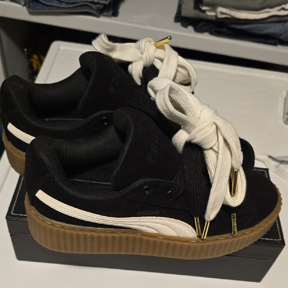Puma Black and White Sneakers with Gold Details